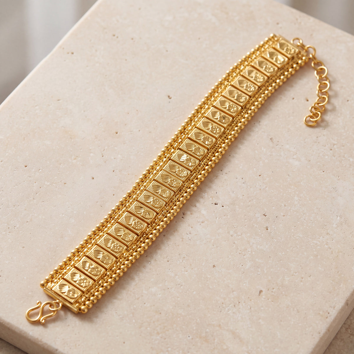1 Line Patta Bracelet (D24) on travertine