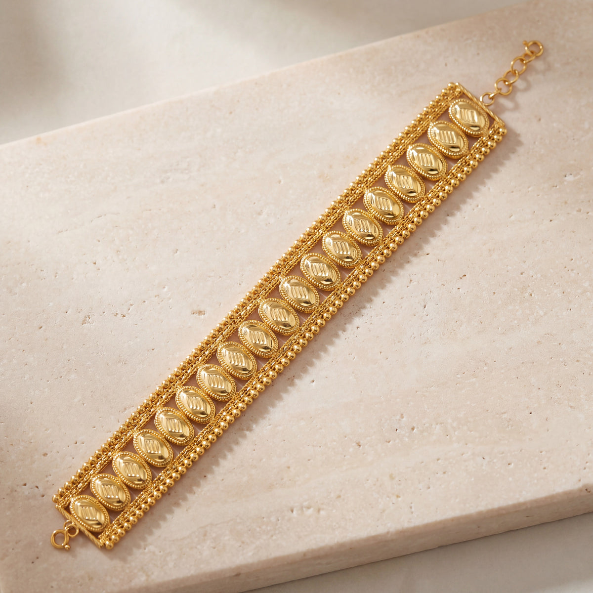 1 Line Patta Bracelet (D26) on travertine