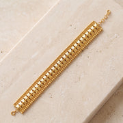 1 Line Patta Bracelet (D28) on travertine