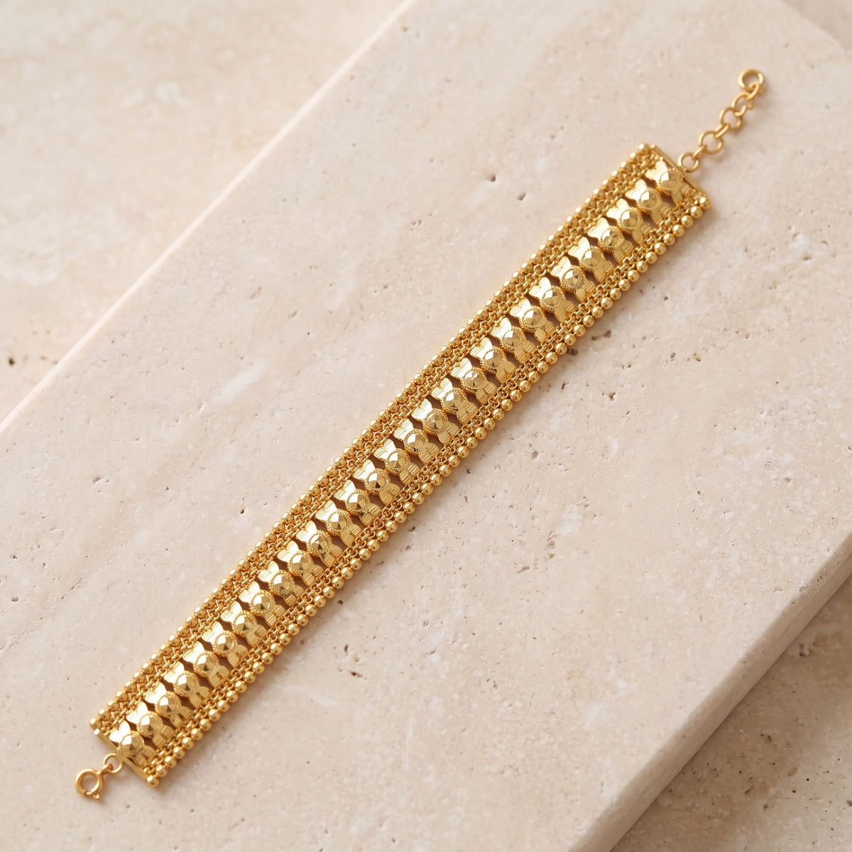 1 Line Patta Bracelet (D28) on travertine