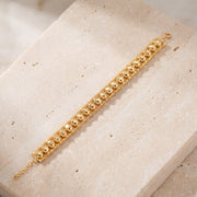 1 Line Patta Bracelet (D34) on travertine