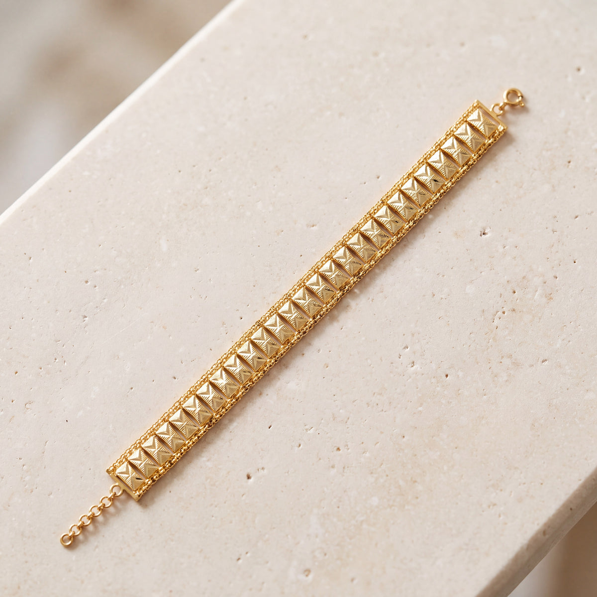 1 Line Patta Bracelet (D35) on travertine