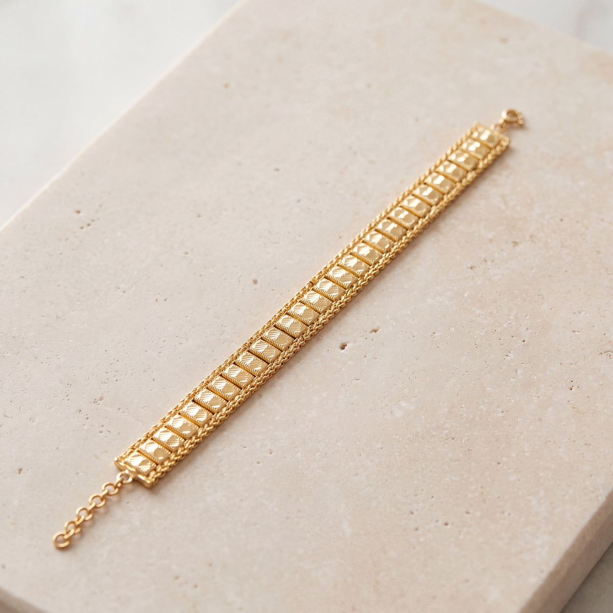 1 Line Patta Bracelet (D36) on travertine