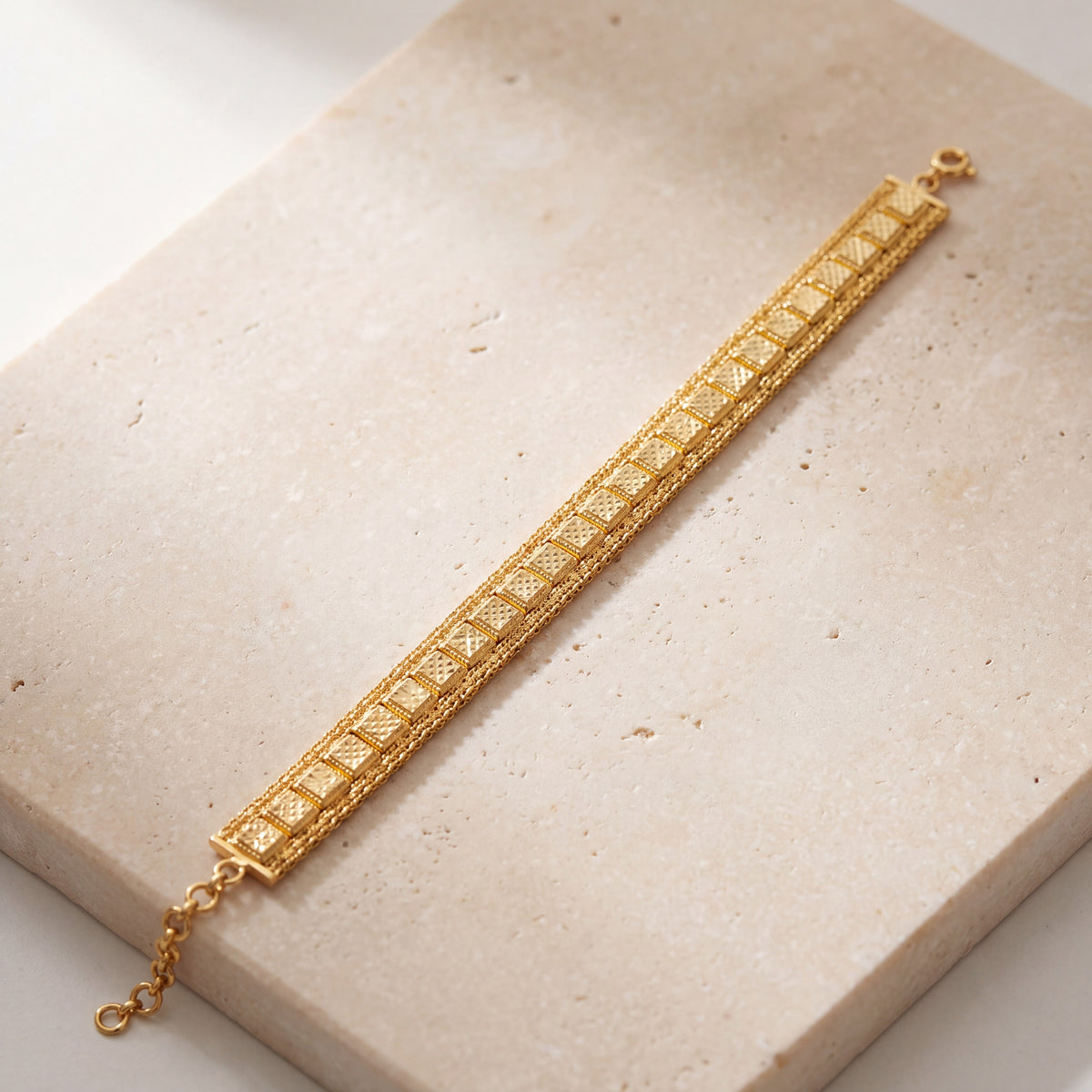 1 Line Patta Bracelet (D38) on travertine