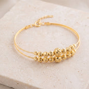 2 Line Kid's Beads Cuff Bracelet (D101) on travertine