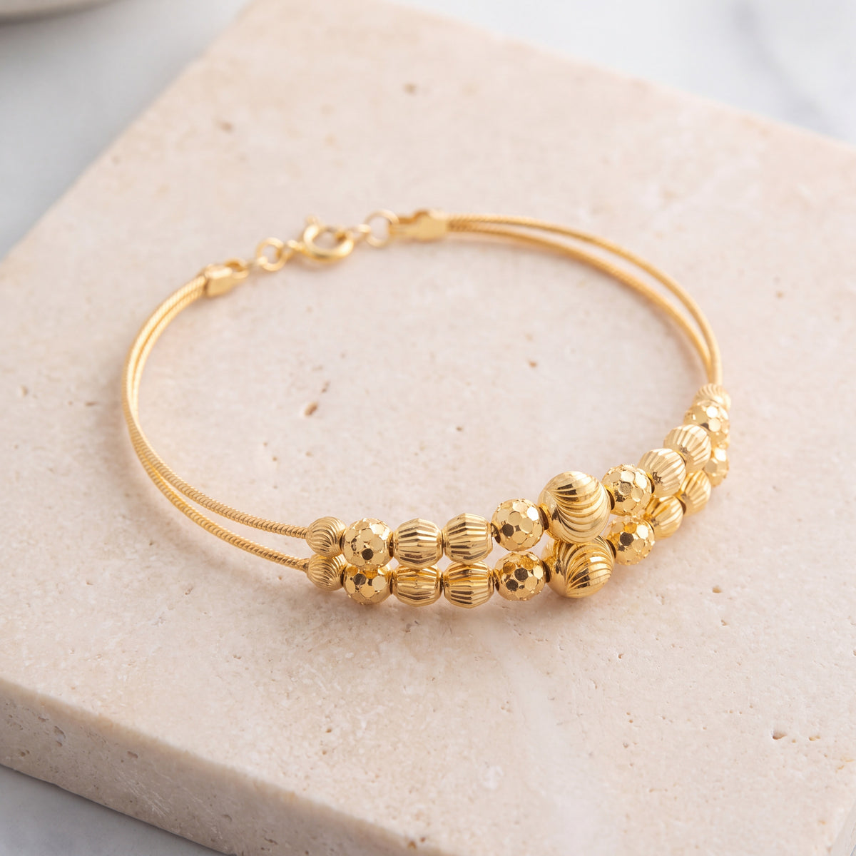 2 Line Kid's Beads Cuff Bracelet (D102) on travertine