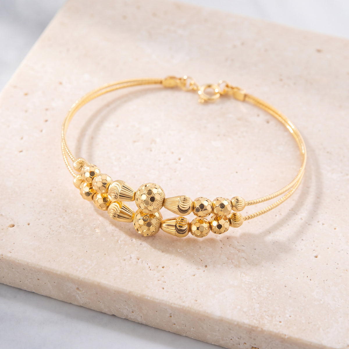 2 Line Kid's Beads Cuff Bracelet (D104) on travertine
