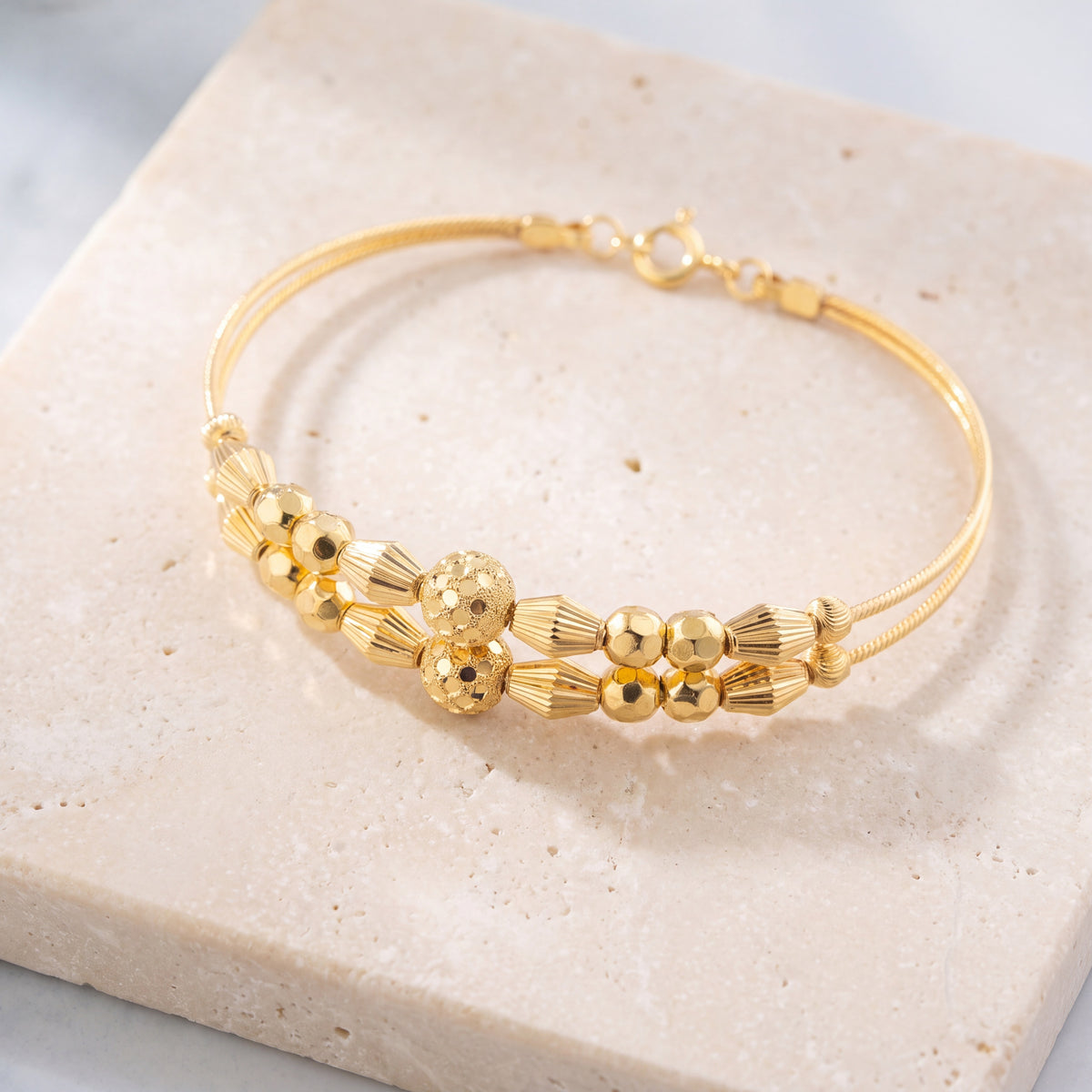 2 Line Kid's Beads Cuff Bracelet (D110) on travertine