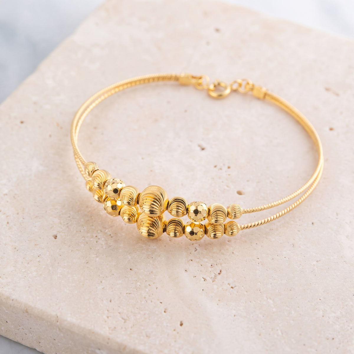 2 Line Kid's Beads Cuff Bracelet (D115) on travertine