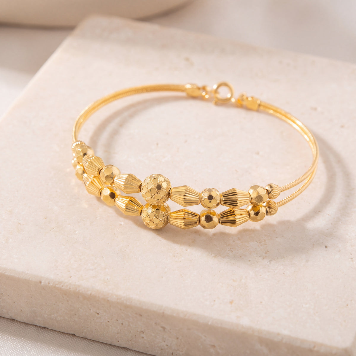 2 Line Kid's Beads Cuff Bracelet (D118) on travertine