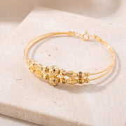 2 Line Kid's Beads Cuff Bracelet (D124) on travertine