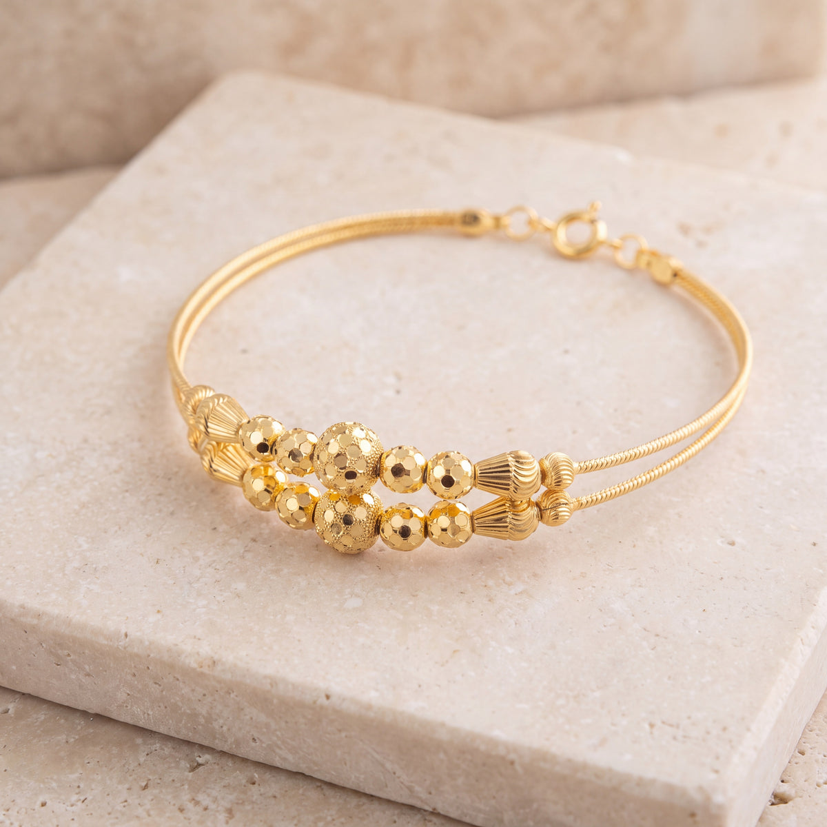 2 Line Kid's Beads Cuff Bracelet (D125) on travertine