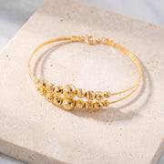2 Line Kid's Beads Cuff Bracelet (D127) on travertine