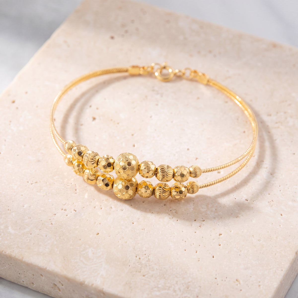 2 Line Kid's Beads Cuff Bracelet (D127) on travertine