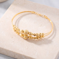 2 Line Kid's Beads Cuff Bracelet (D132) on travertine