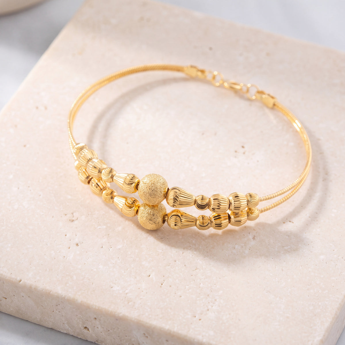 2 Line Kid's Beads Cuff Bracelet (D132) on travertine