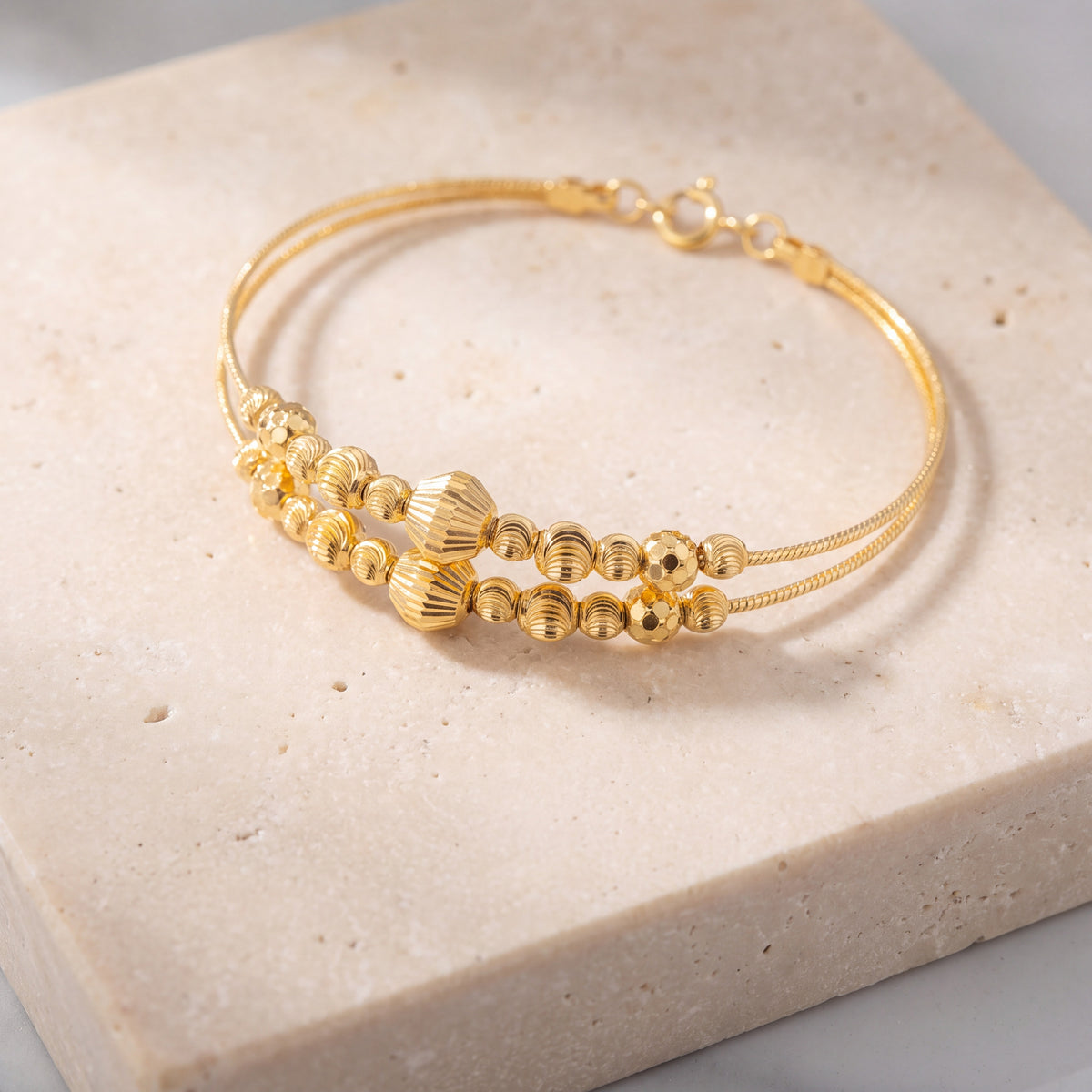 2 Line Kid's Beads Cuff Bracelet (D134) on travertine