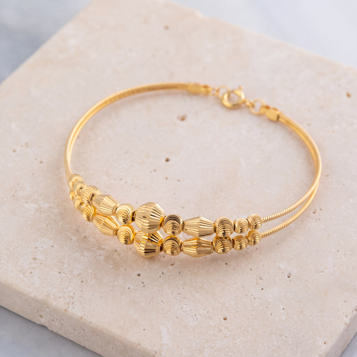2 Line Kid's Beads Cuff Bracelet (D15) on travertine
