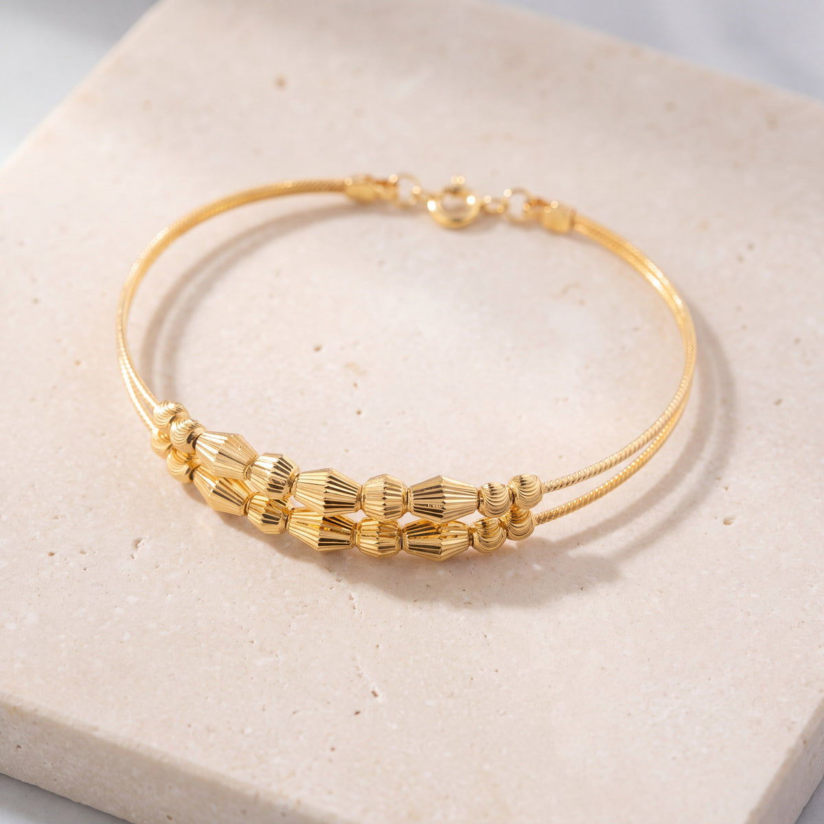 2 Line Kid's Beads Cuff Bracelet (D16) on travertine