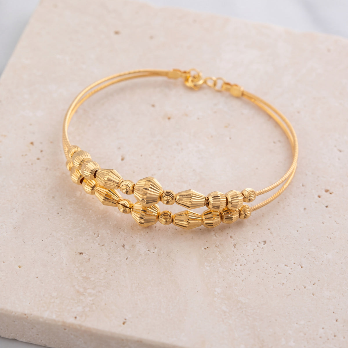 2 Line Kid's Beads Cuff Bracelet (D17) on travertine
