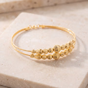 2 Line Kid's Beads Cuff Bracelet (D21) on travertine