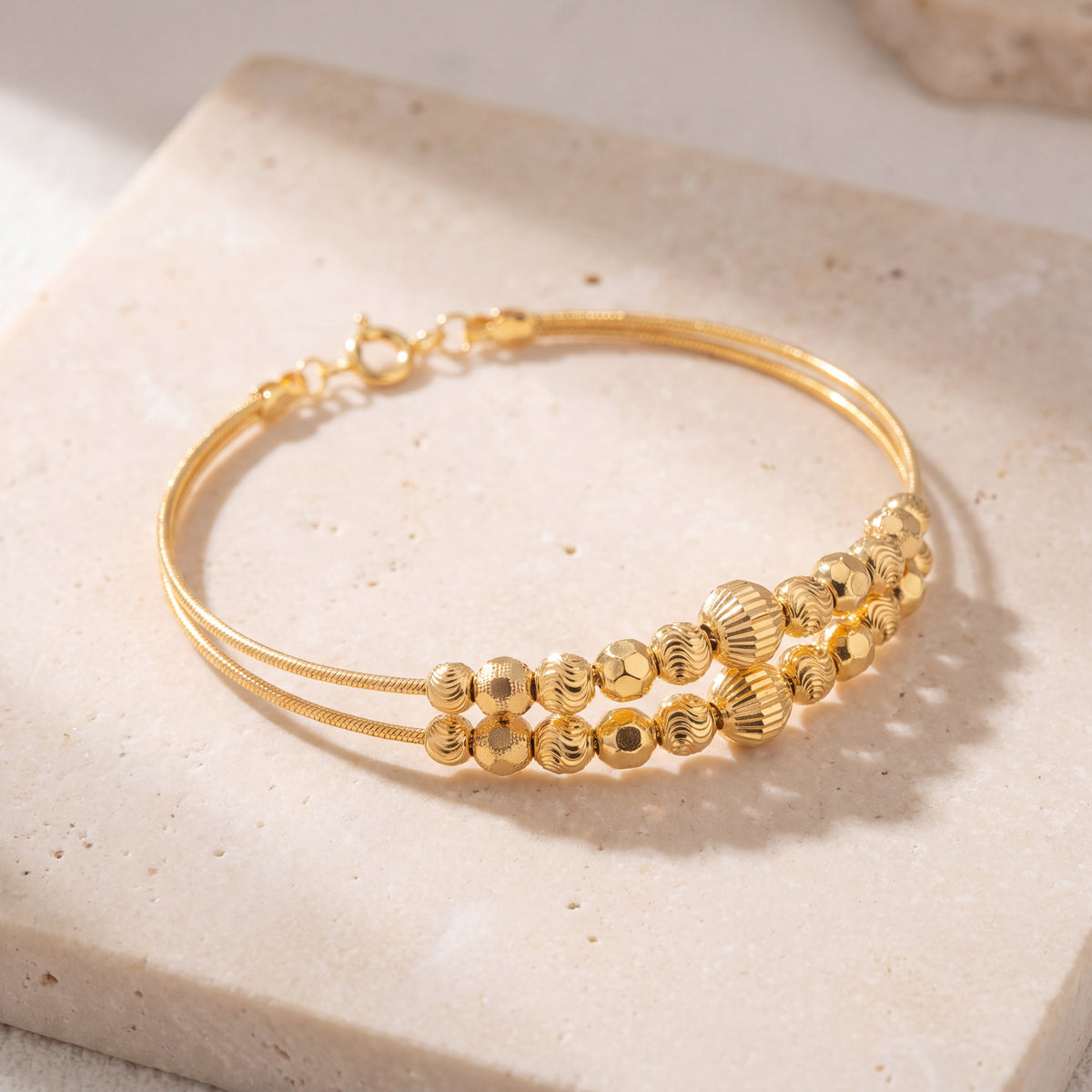 2 Line Kid's Beads Cuff Bracelet (D22) on travertine