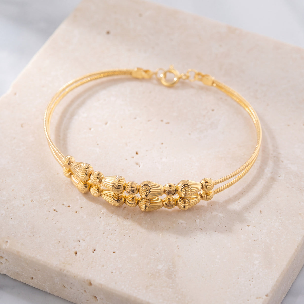 2 Line Kid's Beads Cuff Bracelet (D29) on travertine