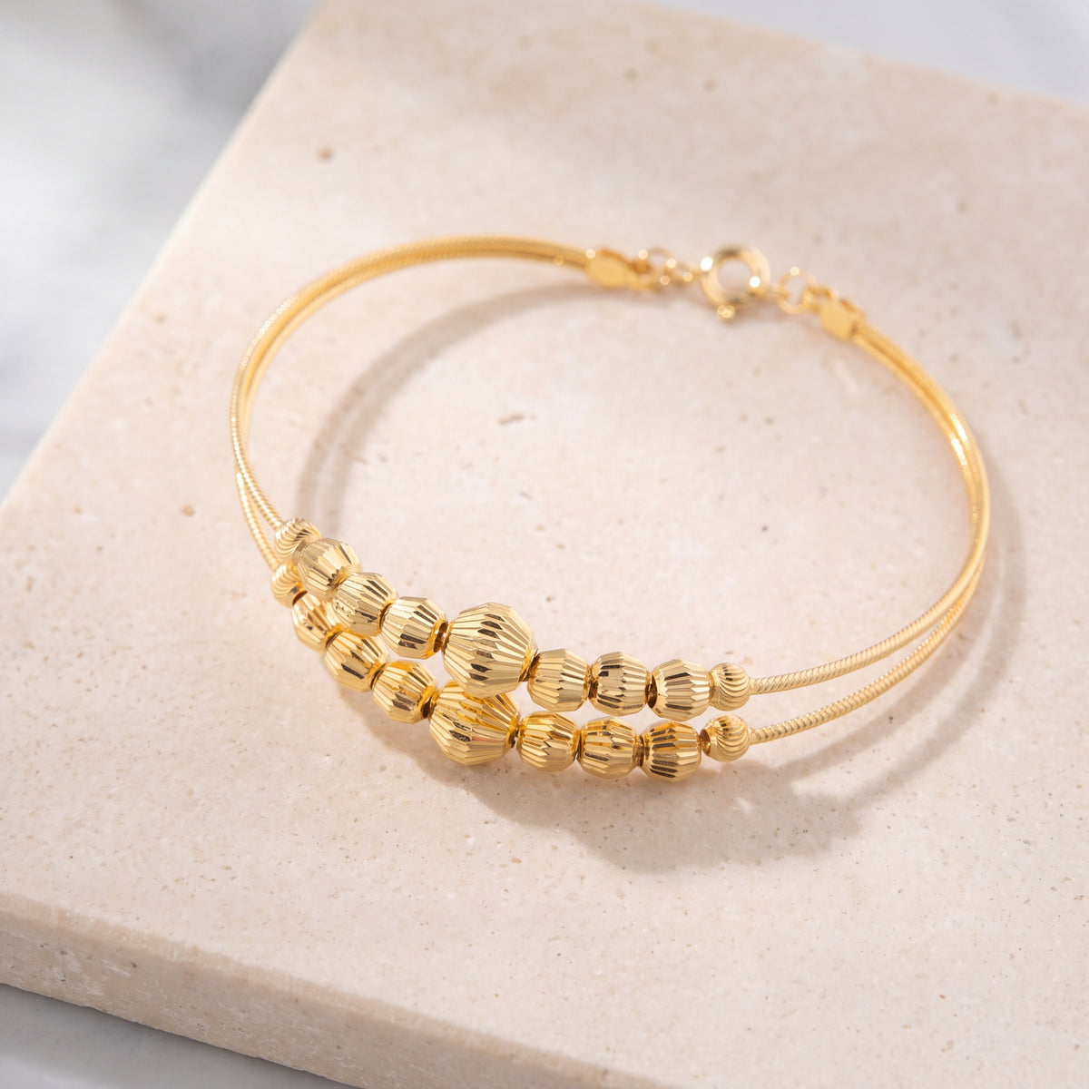 2 Line Kid's Beads Cuff Bracelet (D31) on travertine