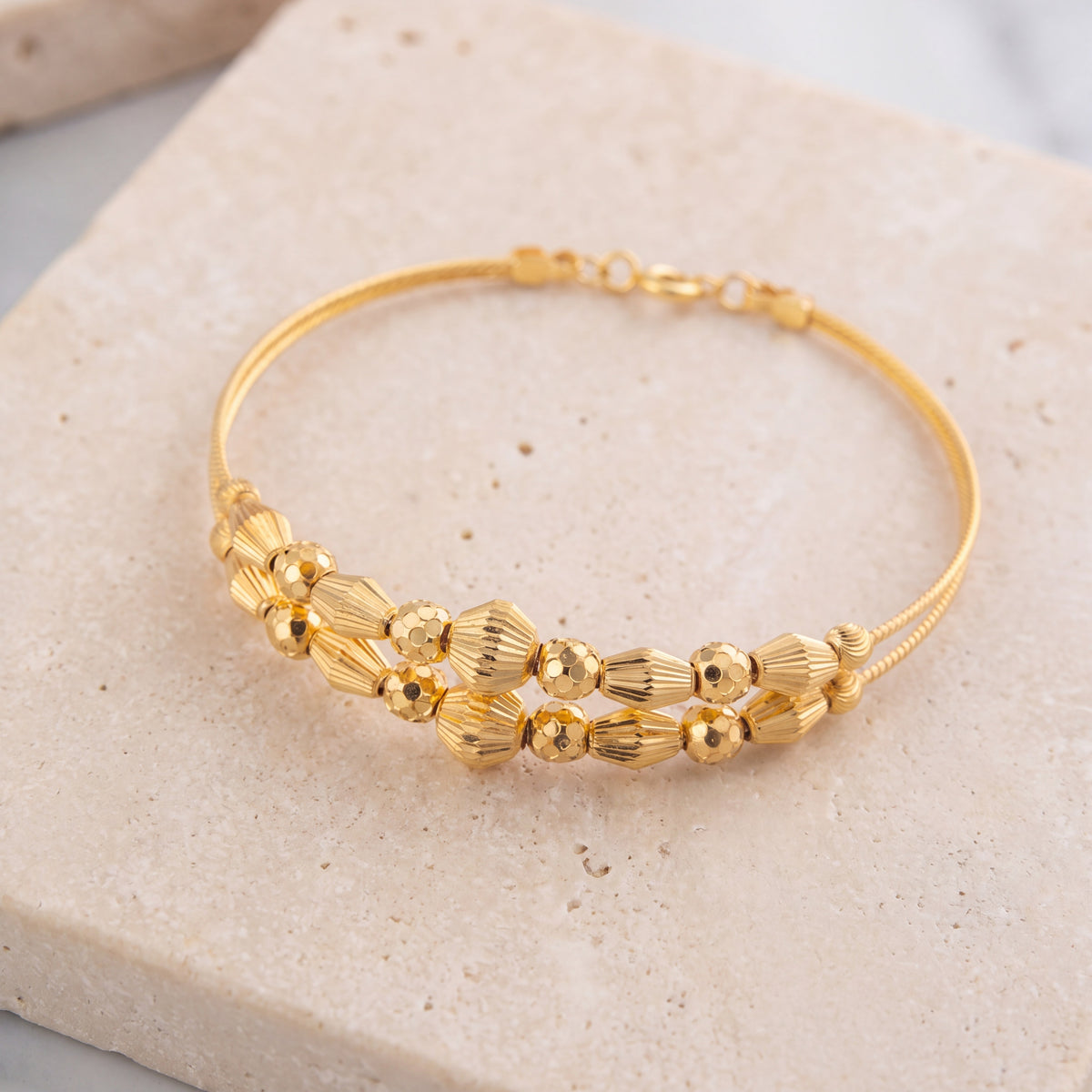 2 Line Kid's Beads Cuff Bracelet (D32) on travertine