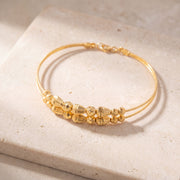 2 Line Kid's Beads Cuff Bracelet (D36) on travertine