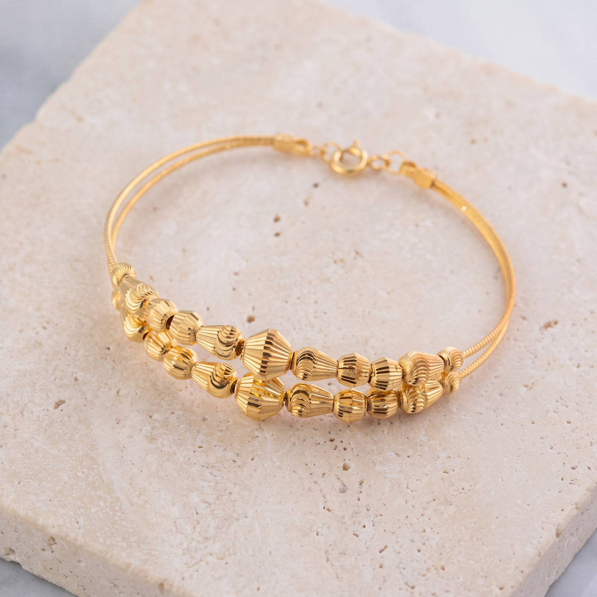 2 Line Kid's Beads Cuff Bracelet (D39) on travertine