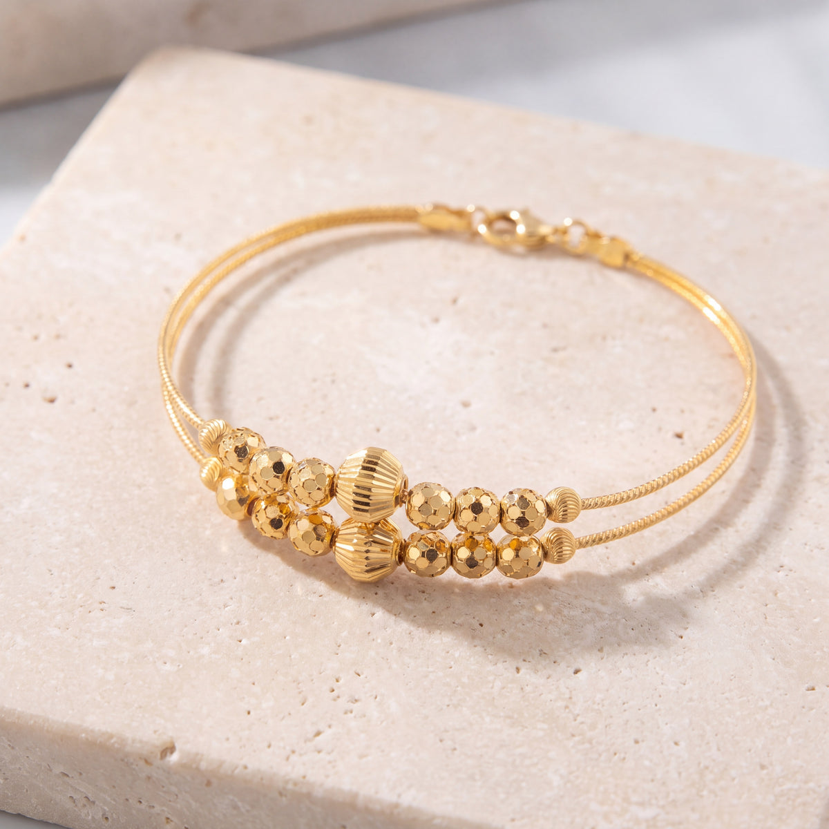 2 Line Kid's Beads Cuff Bracelet (D41) on travertine