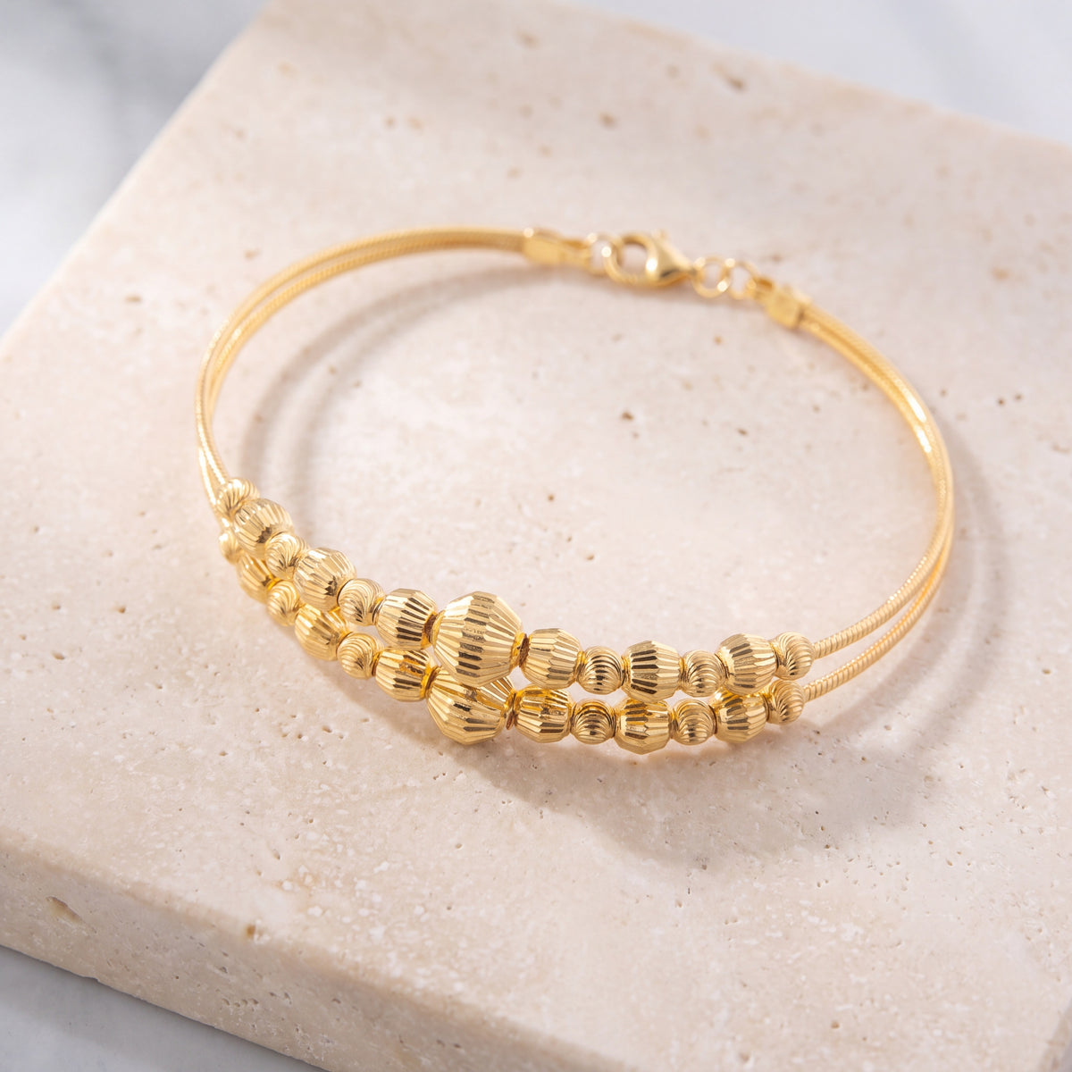 2 Line Kid's Beads Cuff Bracelet (D42) on travertine