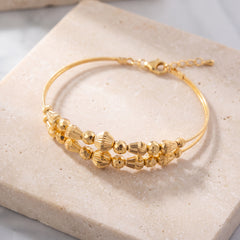 2 Line Kid's Beads Cuff Bracelet (D46) on travertine