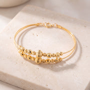 2 Line Kid's Beads Cuff Bracelet (D50) on travertine