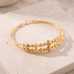 2 Line Kid's Beads Cuff Bracelet (D51) on travertine