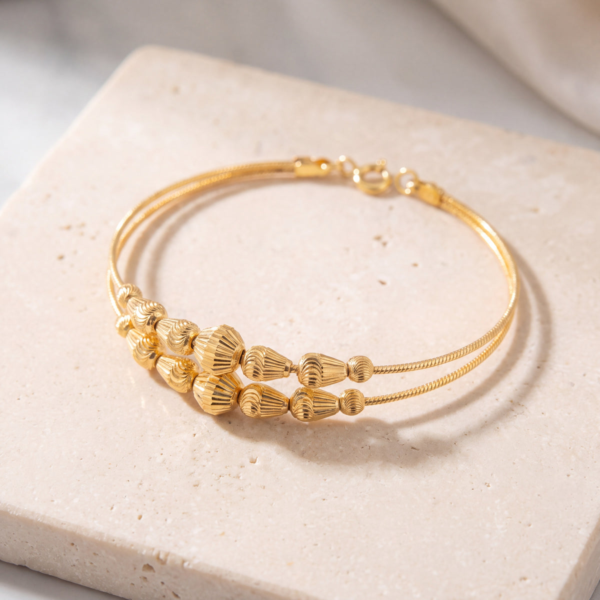 2 Line Kid's Beads Cuff Bracelet (D53) on travertine