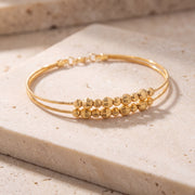 2 Line Kid's Beads Cuff Bracelet (D57) on travertine