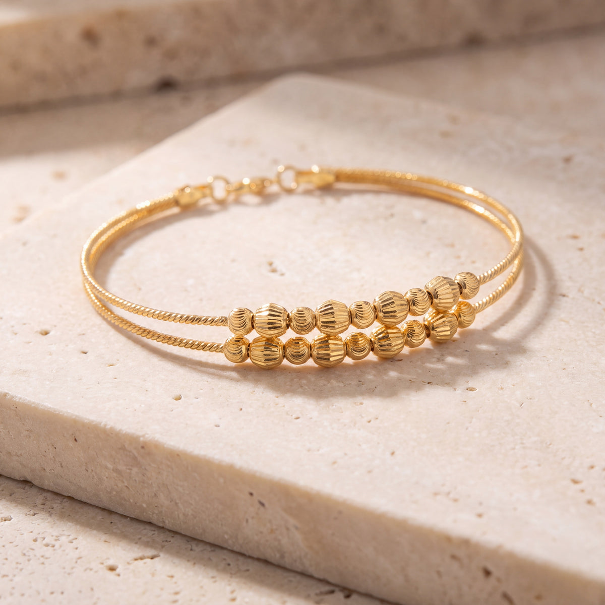 2 Line Kid's Beads Cuff Bracelet (D57) on travertine