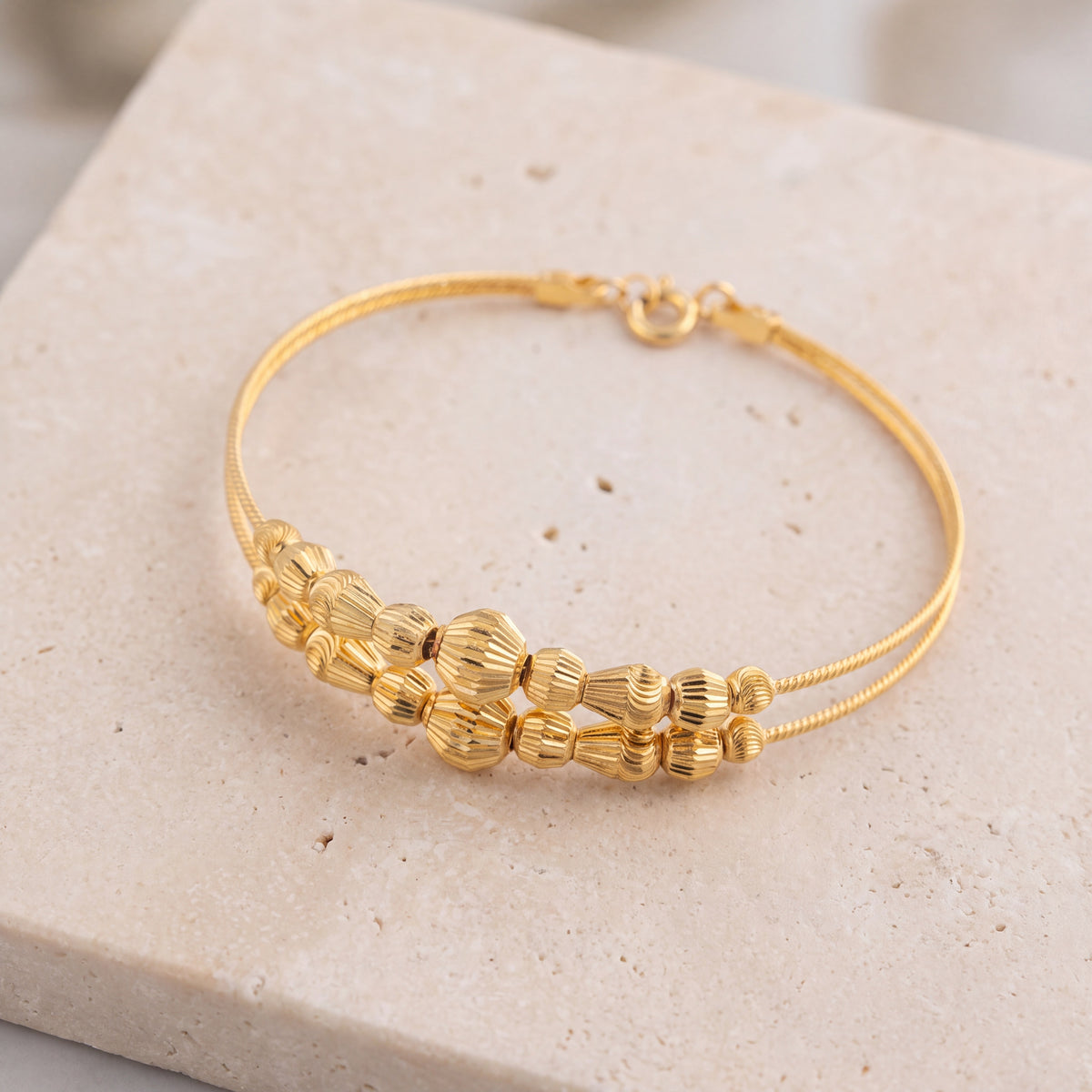 2 Line Kid's Beads Cuff Bracelet (D58) on travertine