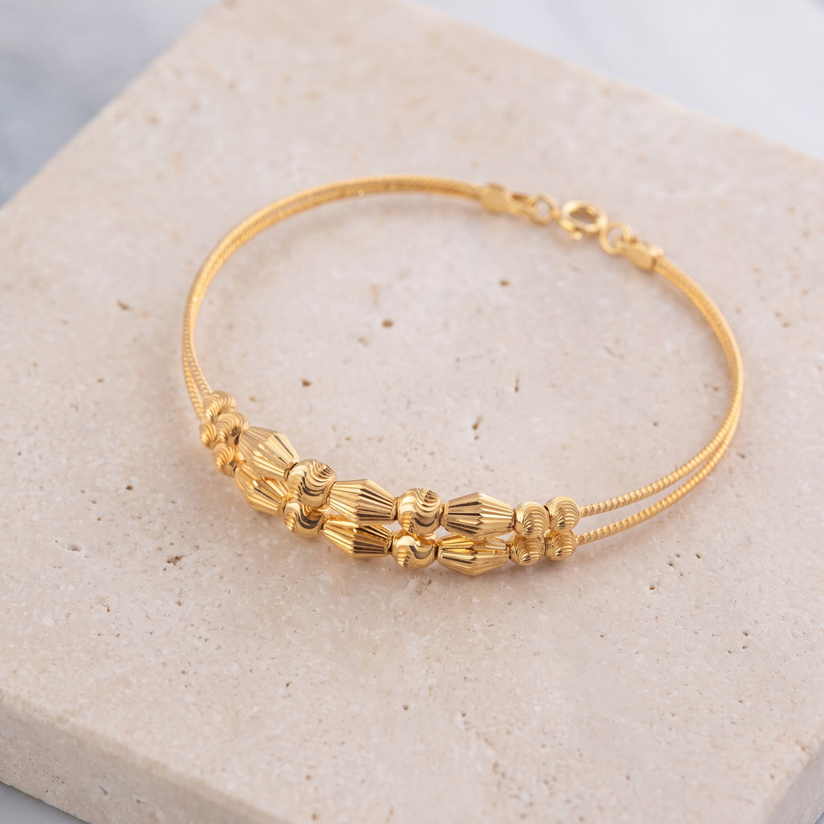 2 Line Kid's Beads Cuff Bracelet (D59) on travertine