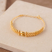 2 Line Kid's Beads Cuff Bracelet (D6) on travertine