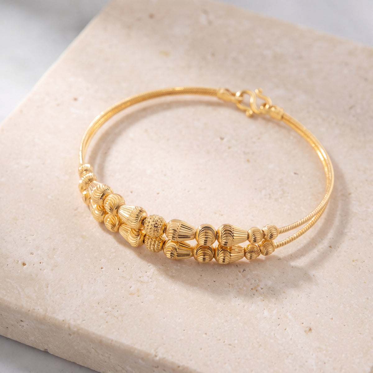 2 Line Kid's Beads Cuff Bracelet (D61) on travertine