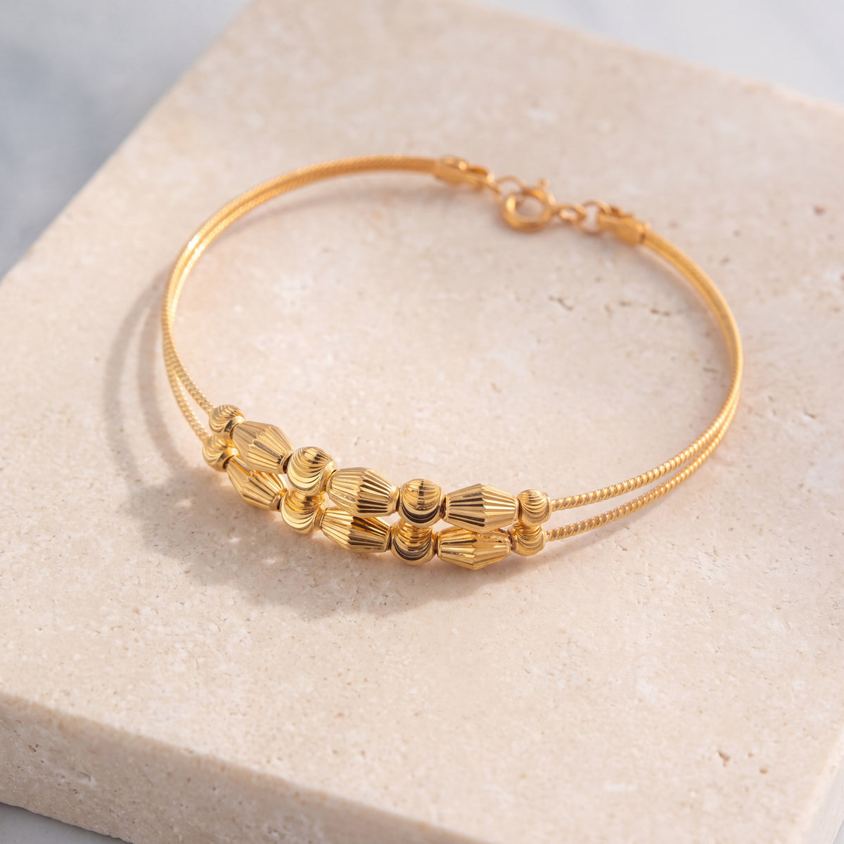 2 Line Kid's Beads Cuff Bracelet (D66) on travertine