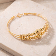 2 Line Kid's Beads Cuff Bracelet (D71) on travertine