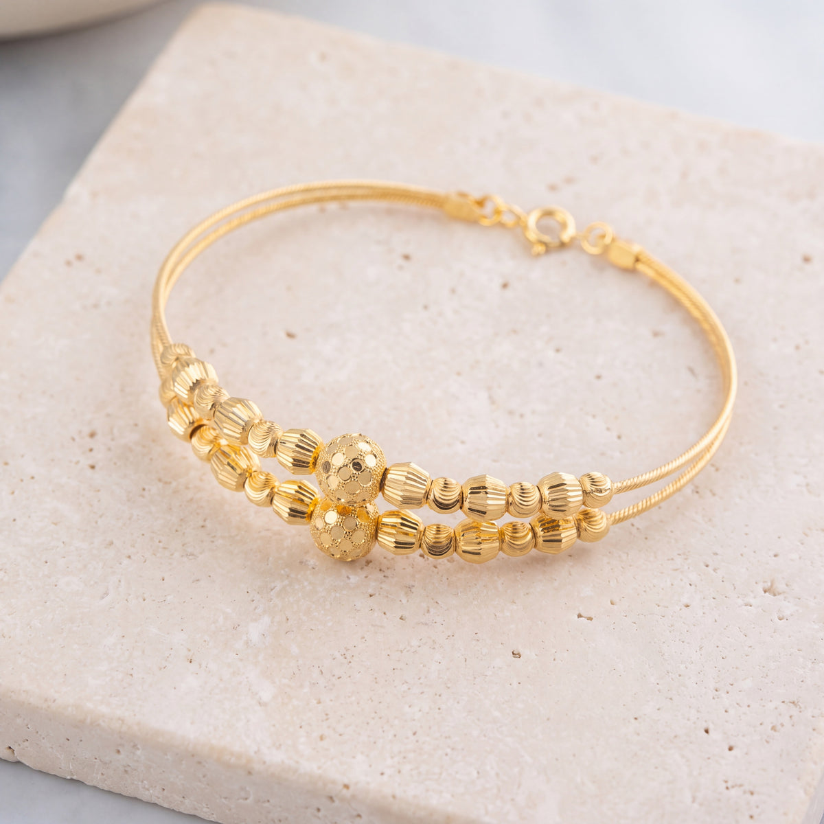 2 Line Kid's Beads Cuff Bracelet (D73) on travertine