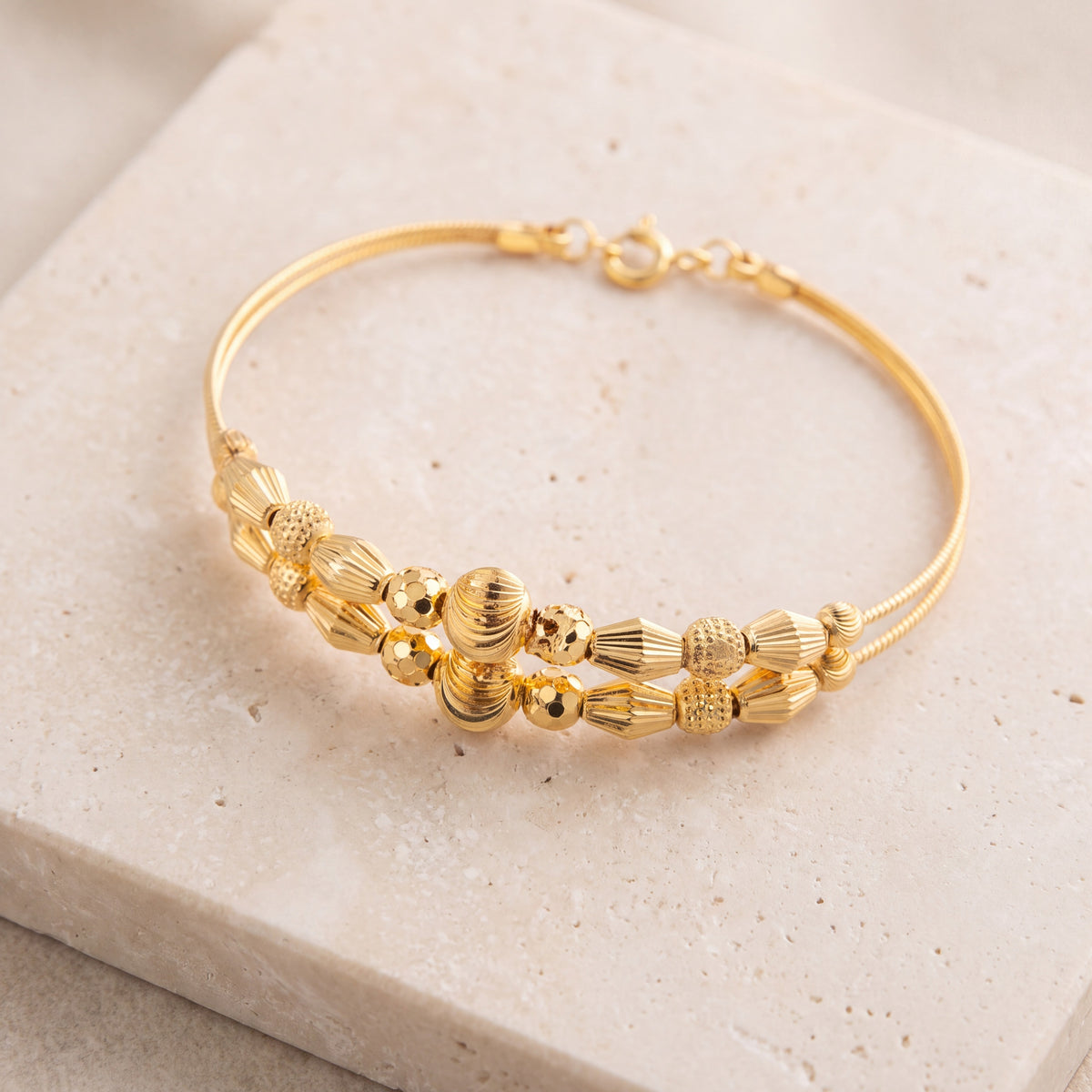 2 Line Kid's Beads Cuff Bracelet (D76) on travertine