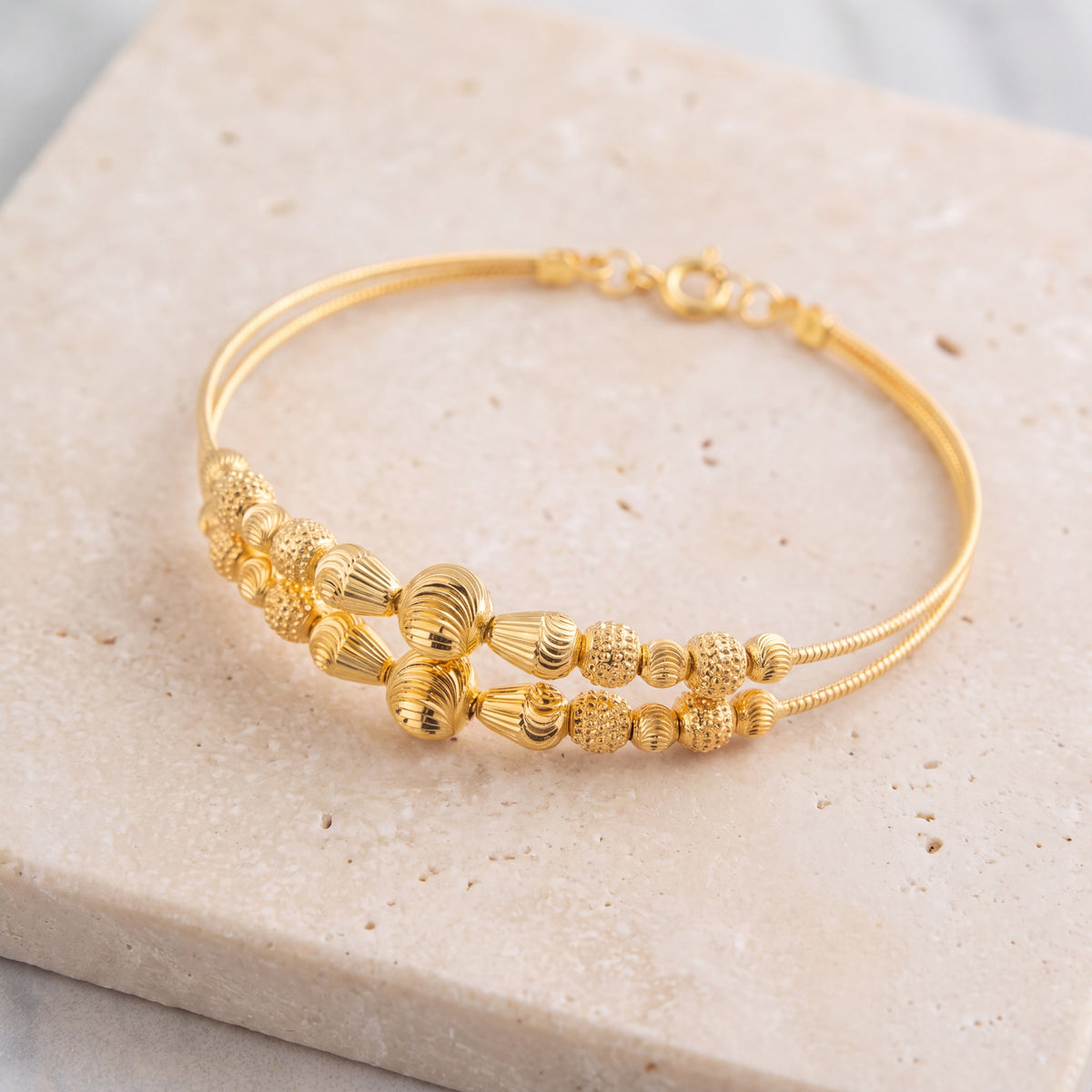 2 Line Kid's Beads Cuff Bracelet (D77) on travertine