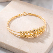 2 Line Kid's Beads Cuff Bracelet (D79) on travertine
