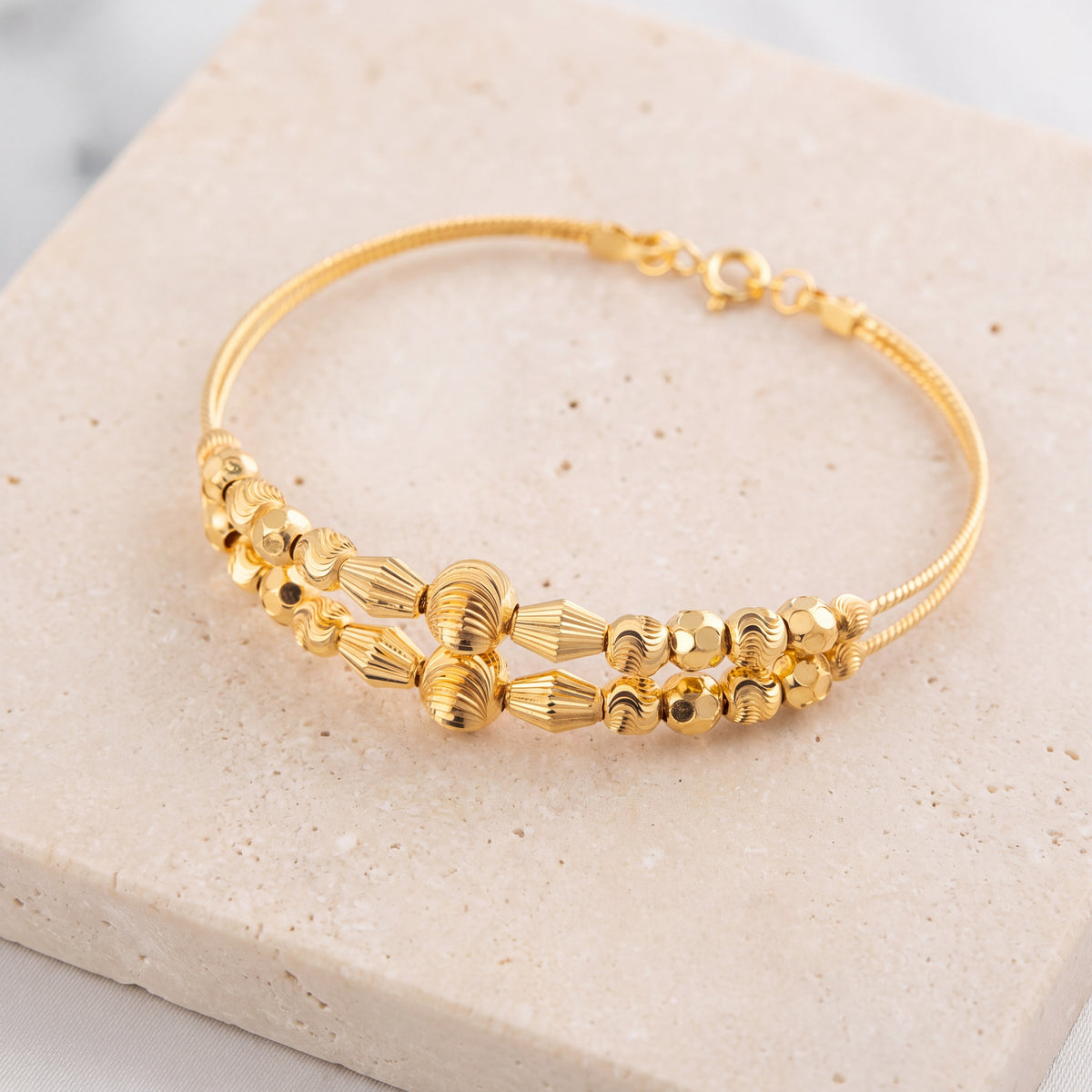 2 Line Kid's Beads Cuff Bracelet (D86) on travertine